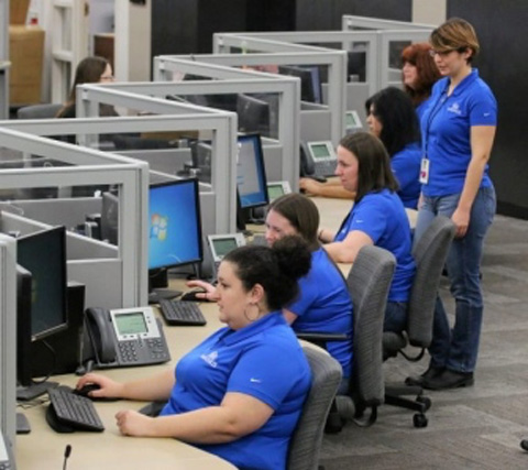 Maximus employeees process data at the Jenkins Twp facilitycv31maximusp2Warren Ruda / The Citizens’ Voice